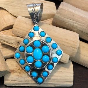 Jay King DTR Sterling sleeping Beauty turquoise stamped pendant.